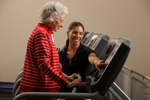 senior woman on a treadmill doing pulmoary rehab