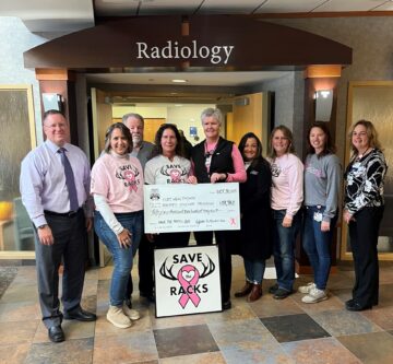 Members of Jefferson 1/2 Mile ATV Club present check to Fort HealthCare Administration and Radiology staff
